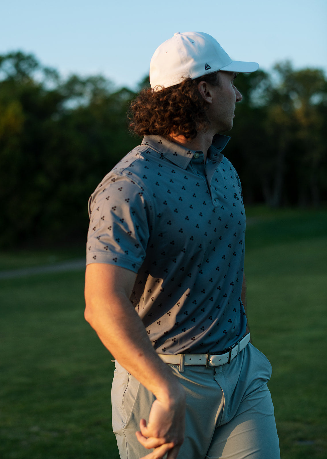 golfer wearing a performance golf polo