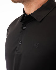 This is a classy golf polo that is jet black all around. It’s breathable, uv protected, 4-way stretch and an athletic fit.