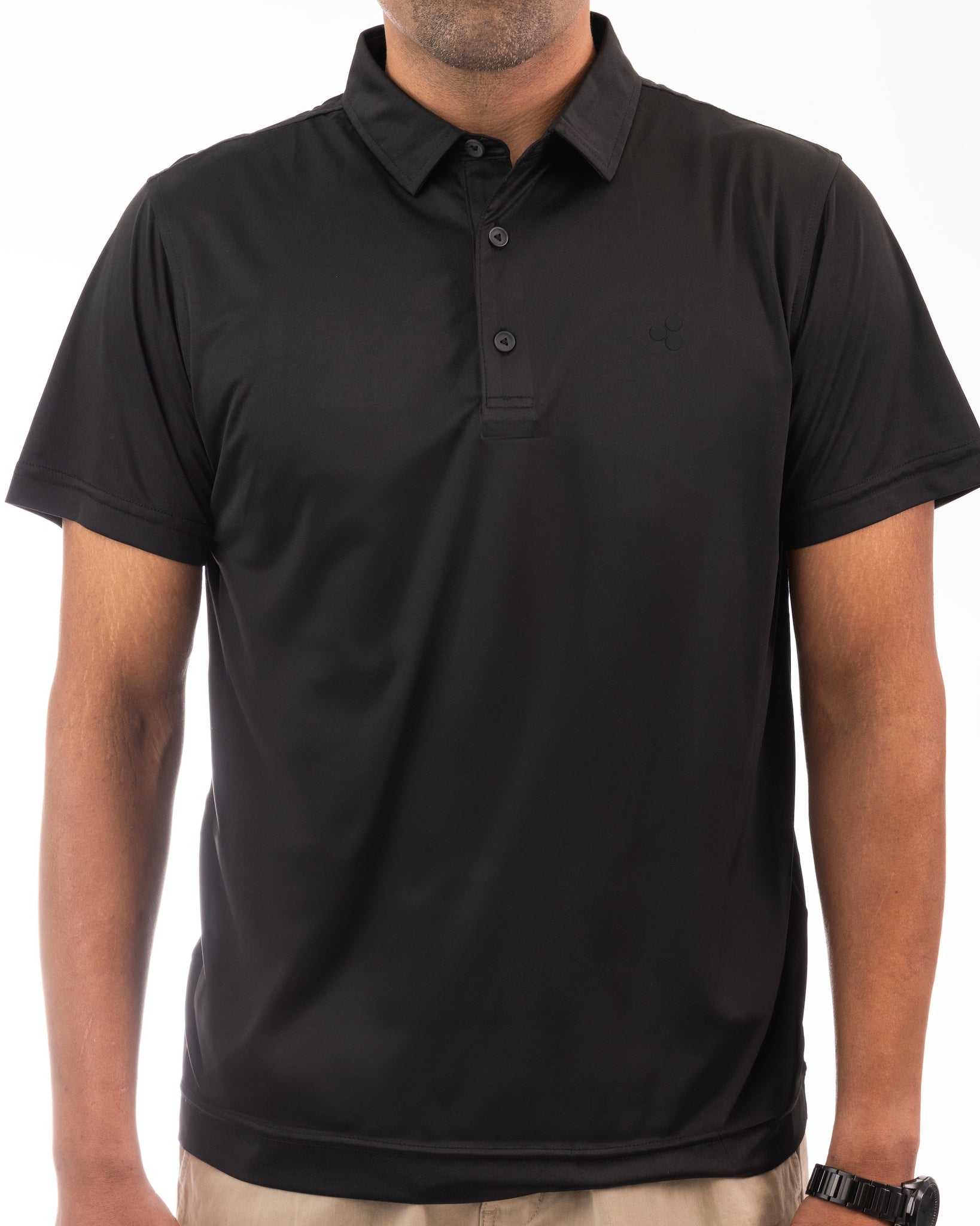 This is a classy golf polo that is jet black all around. It’s breathable, uv protected, 4-way stretch and an athletic fit.