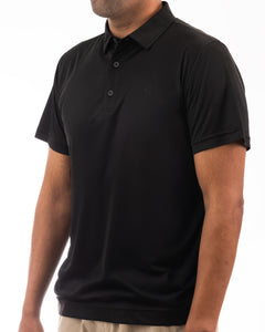 This is a classy golf polo that is jet black all around. It’s breathable, uv protected, 4-way stretch and an athletic fit.