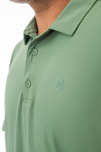 This golf polo is green like the fairways you can’t hit. It’s breathable, moisture wicking, 4-way stretch, and has an athletic fit. 