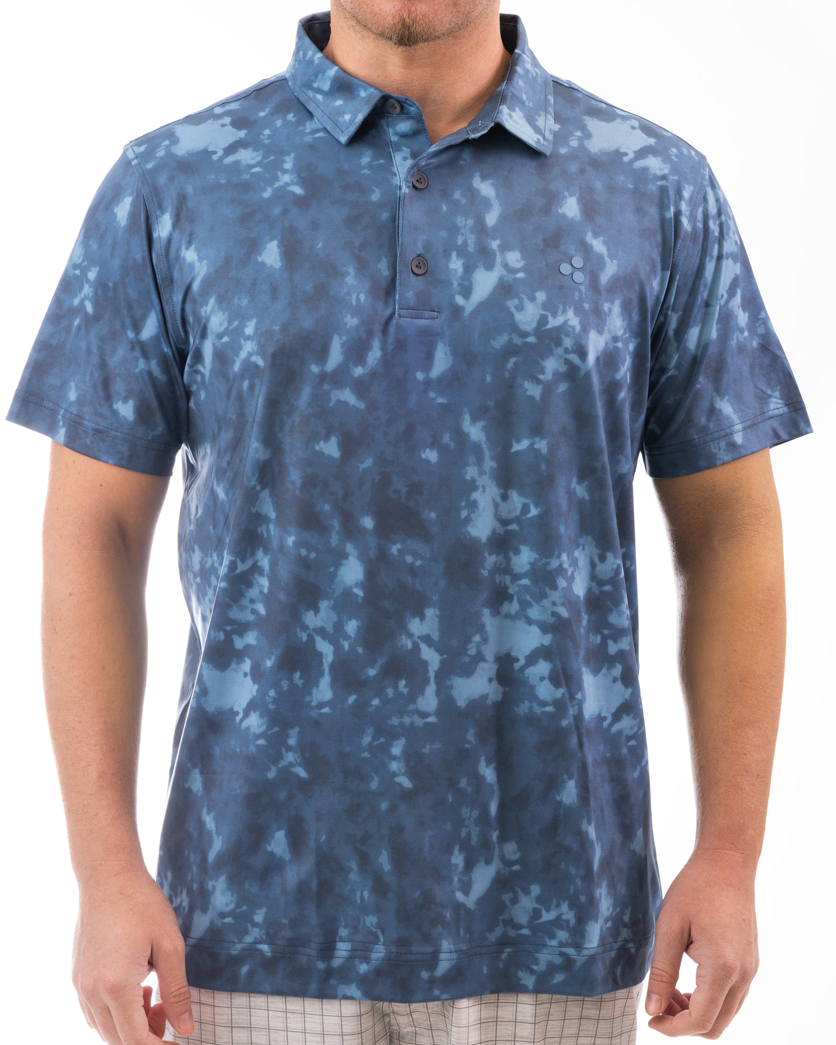 This golf polo is part of our “burn” series. The pattern is a mix between tie-dye and a burnt object. It comes in 3 colors and is moisture wicking, breathable, 4-way stretch and has an athletic fit. 