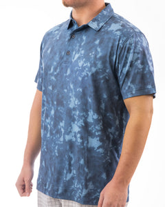 This golf polo is part of our “burn” series. The pattern is a mix between tie-dye and a burnt object. It comes in 3 colors and is moisture wicking, breathable, 4-way stretch and has an athletic fit. 