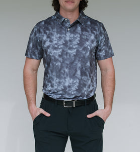 This golf polo is part of our “burn” series. The pattern is a mix between tie-dye and a burnt object. It comes in 3 colors and is moisture wicking, breathable, 4-way stretch and has an athletic fit. 